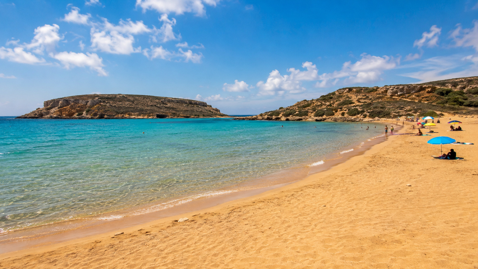 Shallow sea and golden sand in Malta